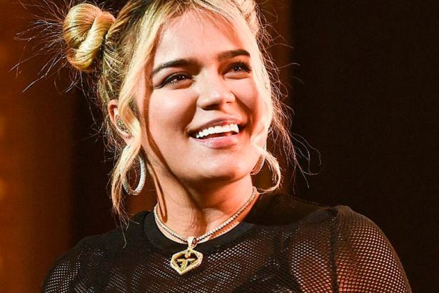 Karol G, cantante, colombiana, Colombia, cautiva, sorprende, fans, redes sociales, viral, hit, éxito, cinta, película, animada, Los locos Addams, musical, video, canción, new single, nuevo tema, nueva canción, tema, canción, single, new, nuevo, nueva, música, Stars World Production