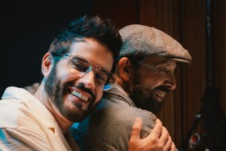 Juan Luis Guerra y Manny Cruz en el estreno de "Nieve en Verano".