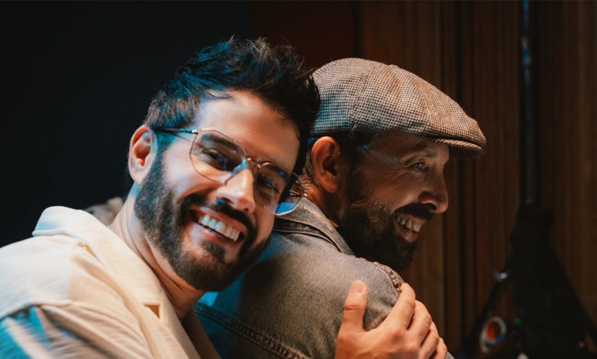 Juan Luis Guerra y Manny Cruz en el estreno de "Nieve en Verano".